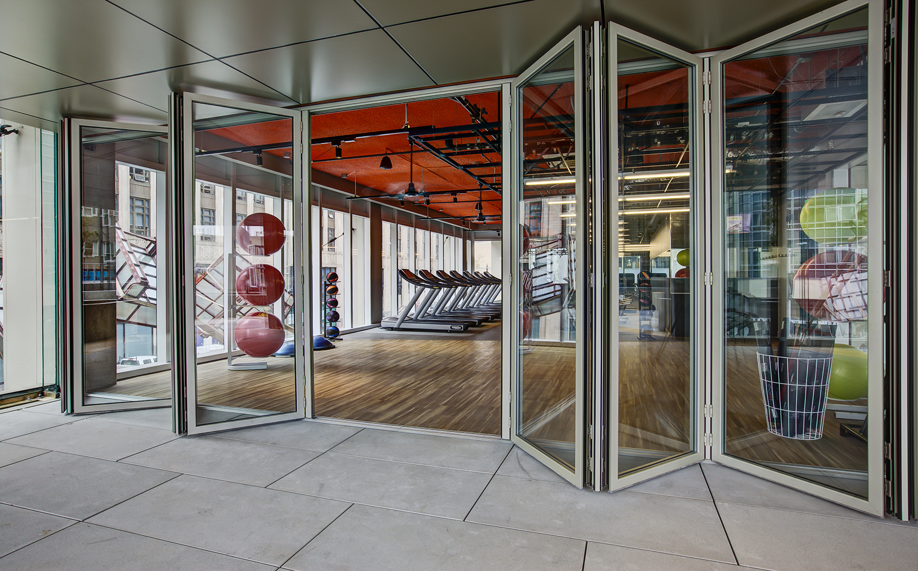 Fitness center with cardio equipment and stretching area  